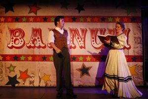 Jason Bowen as P.T. Barnum and Laura Sturm as Charity Barnum Photo