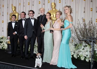 Producer Thomas Langmann, actor Jean Dujardin, director Michel Hazanavicius, actors J Photo