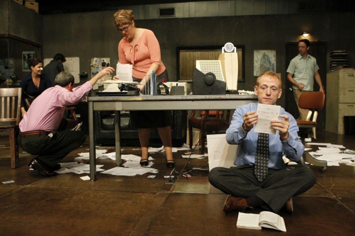 Scott Shepherd (foreground) and the company in GATZ, created by Elevator Repair Service and directed by John Collins, running at The Public Theater. Photo credit: Joan Marcus at 