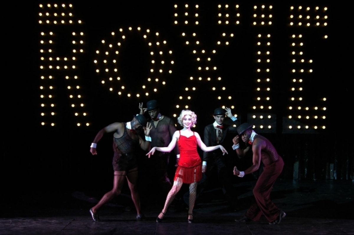 Alexis Grace (center) portrays murderess Roxie Hart in the Theatre Memphis production of Chicago, March 9 Ã¢â‚¬â€�" April 1, 2012.  She is framed by Ã¢â‚¬Å“her boysÃ¢â‚¬Â (from left, clockwise) Justin Nelson, Jared Johnson, Chris Hanford and Mark Gill. at 