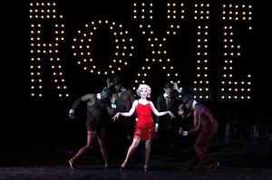 Alexis Grace (center) portrays murderess Roxie Hart in the Theatre Memphis production Photo