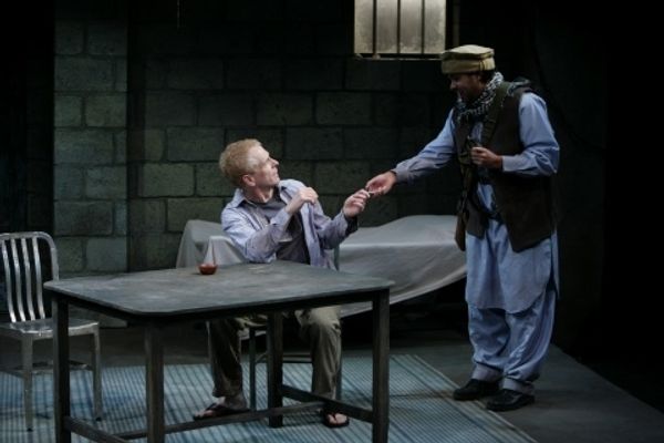 John Hickok as Nick and Ahmed Hassan as Dar Photo