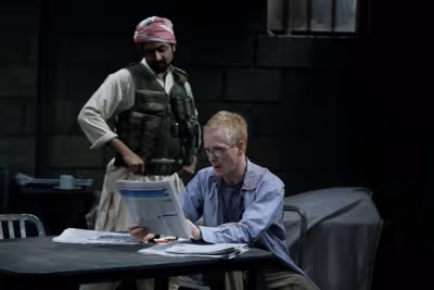 Bhavesh Patel as Bashir and John Hickok as Nick Photo