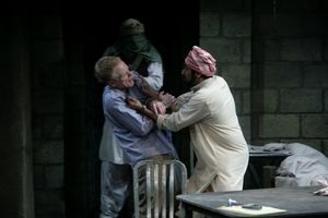 Michael James Reed as the guard, John Hickok as Nick and Bhavesh Patel as Bashir @ BroadwayWorld Michael James Reed as the guard, John Hickok as Nick and Bhavesh Patel as Bashir Photo