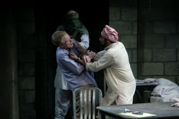 Michael James Reed as the guard, John Hickok as Nick and Bhavesh Patel as Bashir Photo