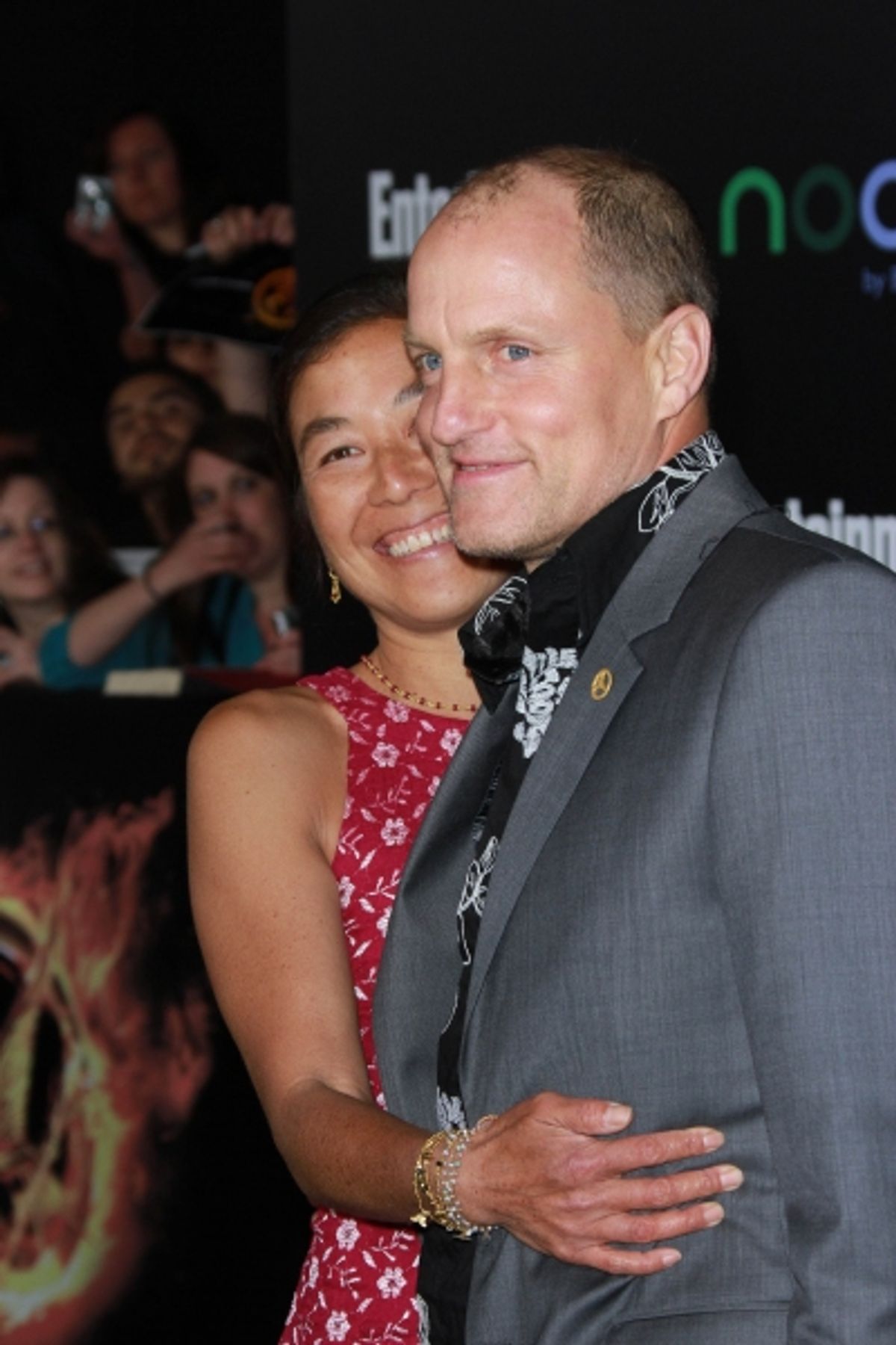 Woody Harrelson and Laura Louie