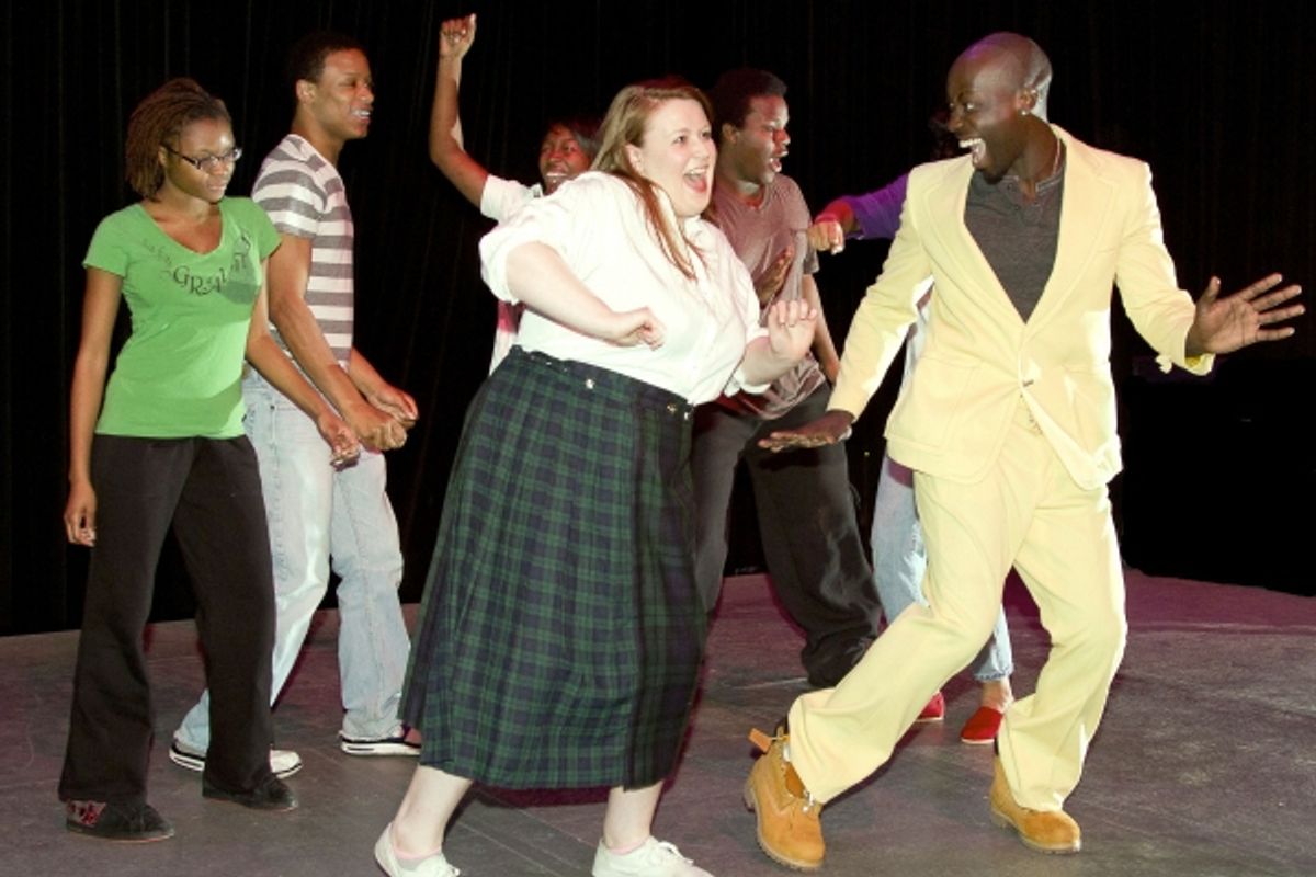 Kristen Kane of Plainsboro as Tracy Turnblad and Tommy Thomas of Georgetown, England as Seaweed J. Stubbs.  In back, from left are ensemble members Nilah Montgomery, Adiin Clemons, Domonique Jarrett and Maleek Colvin. at 