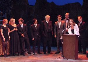 Jennifer Pollono accepts the Production Award for Small Engine Repair with members of Photo