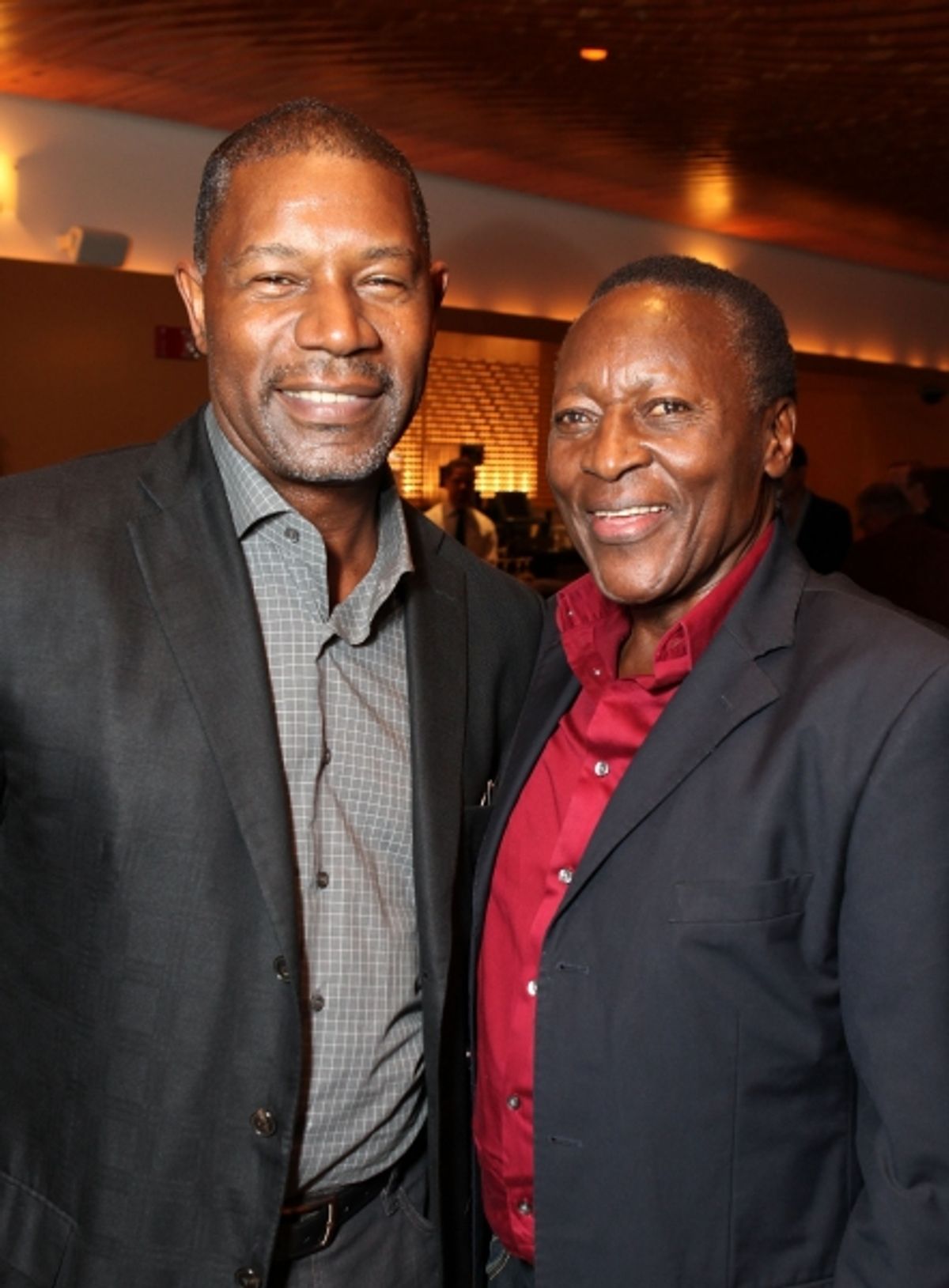 Celebrity judge Dennis Haysbert (L) and actor Oliver Litondo (R)
 at 