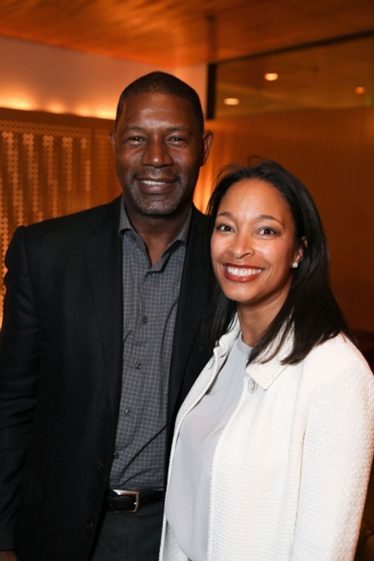 Celebrity judge Dennis Haysbert (L) and Leslie K. Johnson, Director of Education and Community Partnerships, CTG (R)
 at 
