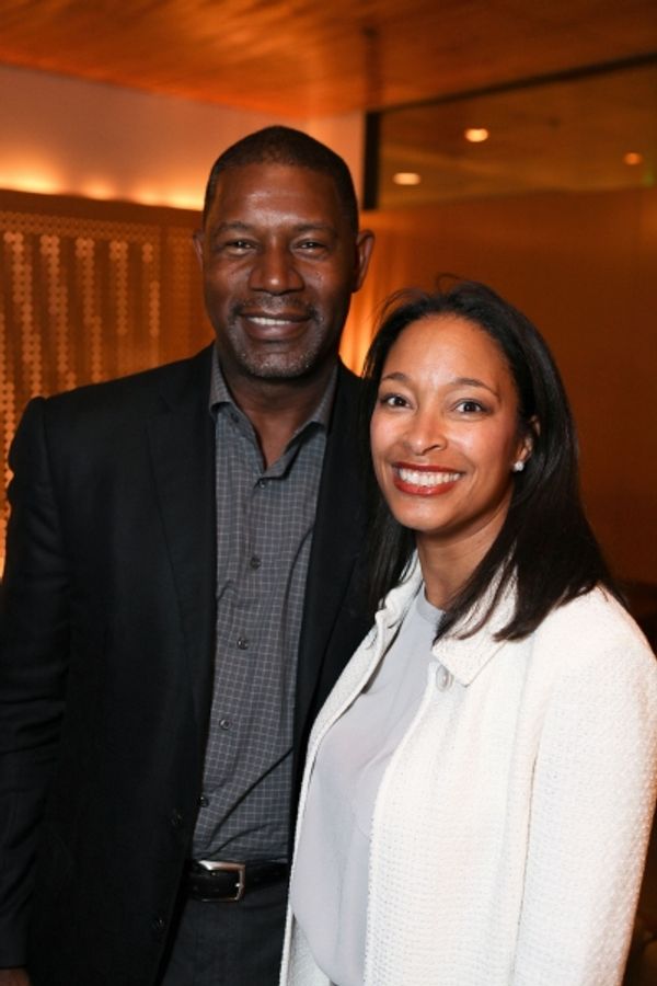 Celebrity judge Dennis Haysbert (L) and Leslie K. Johnson, Director of Education and  Photo