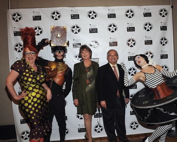 Cirque du Soleil's Iris characters pose with Hollywood Arts Council President Nyla Ar Photo