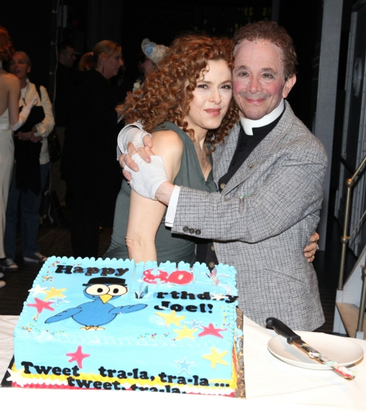 Bernadette Peters surprises Joel Grey on his 80th birthday with a cake backstage at 'Anything Goes' at the Stephen Sondheim Theatre in New York City on April 11, 2012 Ã‚Â© Walter McBride / WM Photography  Ltd. at 