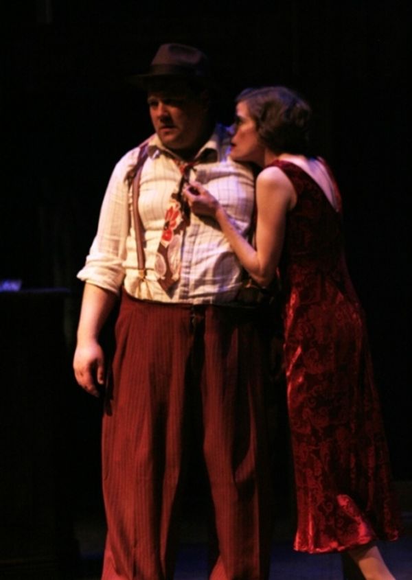 Fred Barker (Matt Erkel) and his girlfriend Paula Harmon (Kimberly Richardson) are bo Photo