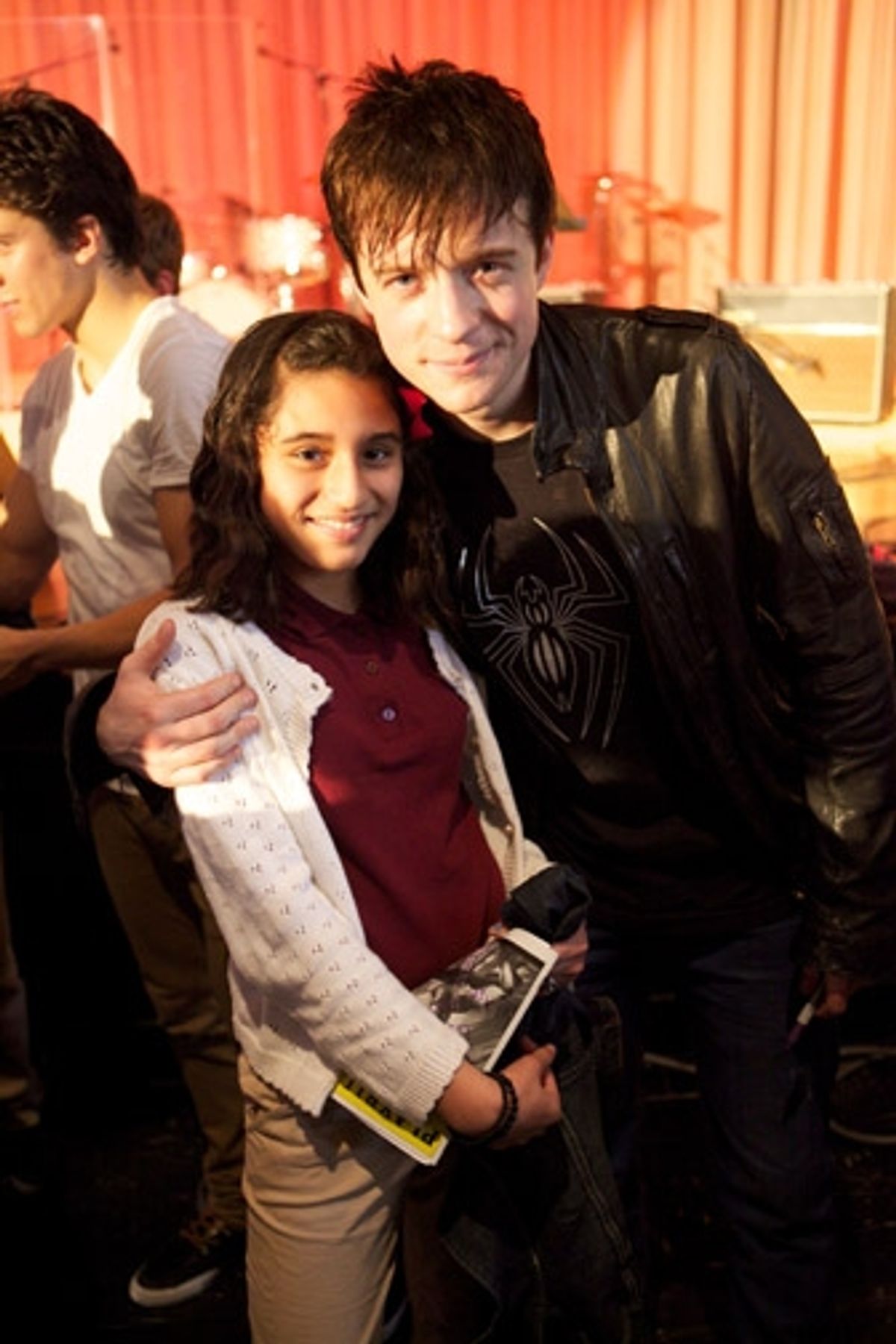 Matthew James Thomas and one of the students of Middle School 343 at 