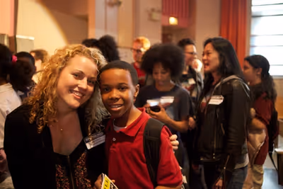 Rebecca Faulkenberry and one of the students of Middle School 343 Photo