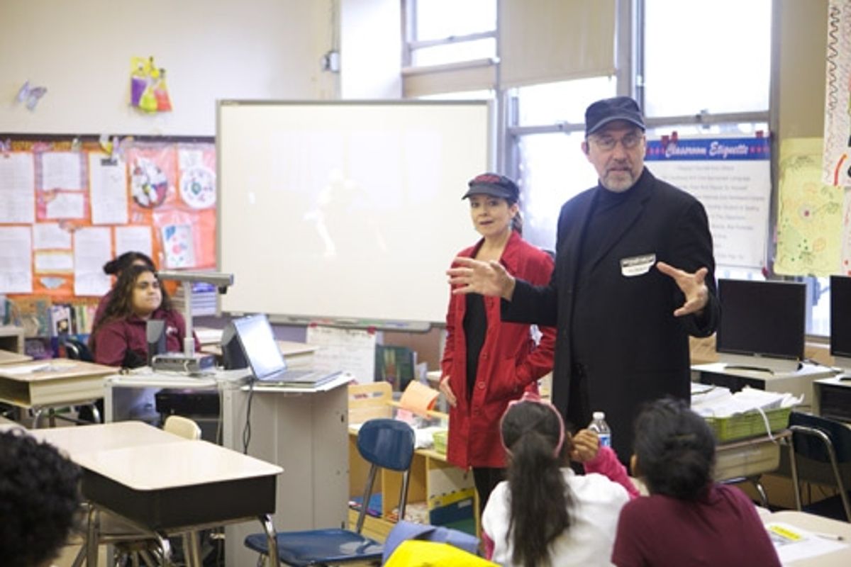 Isabel Keating and Phil McKinley conduct a class for the students of Middle School 343 at 