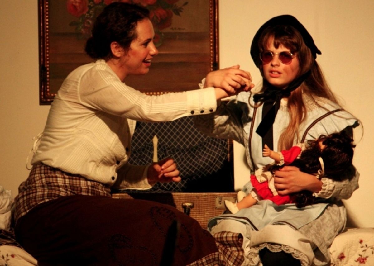 Annie (Faith Streng) begins teaching Helen (Francesca Farina) at 