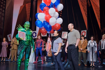 Patrick Page presents a VIP package to 1 millionth audience member Yvelisse Fermin an Photo