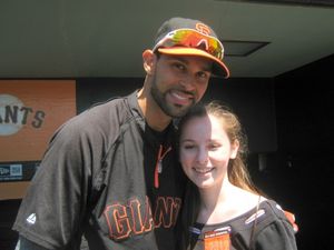 Julia Belanoff and Giants center-fielder Angel Pagan Photo