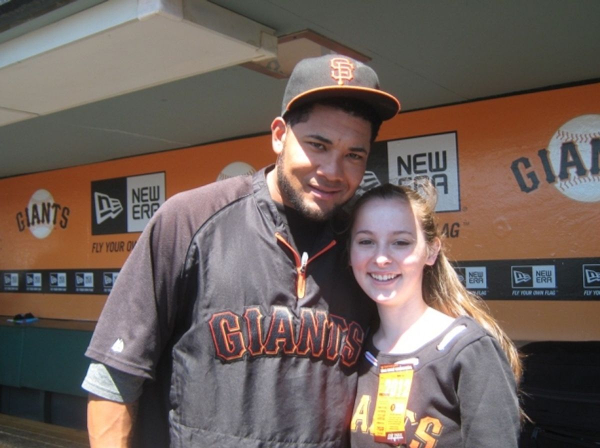 Julia Belanoff with Giants left-fielder Melky Cabrera at 