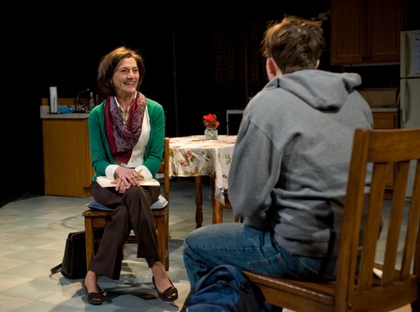 Kate Deckhouse (Janet Ulrich Brooks) speaks with Paulie (Joey deBettencourt), one of  Photo