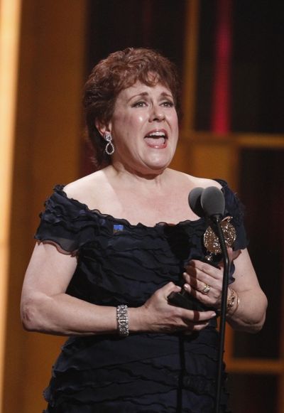 Judy Kaye holds her award for best performance by an actress in a featured role in a  Photo