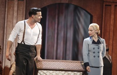 Elena Roger from the play "Evita" performs with singer Ricky Martin Photo