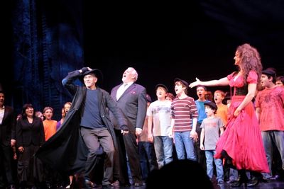 Brian Stokes Mitchell, Jim Brochu, Melissa Errico and the company of Oliver
 Photo