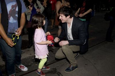 Matthew James Thomas and a Young Fan Photo