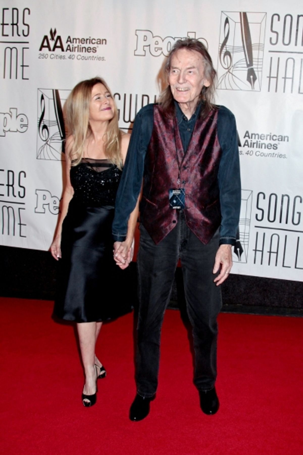 Gordon Lightfoot and fiancÃ©e Kim
 at 