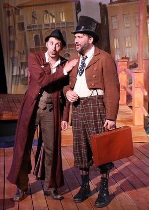 Philip Mutz as Antipholus of Ephesus schemes a plan with Angelo the goldsmith played by Jay Leibowitz @ BroadwayWorld Philip Mutz as Antipholus of Ephesus schemes a plan with Angelo the goldsmith played Photo