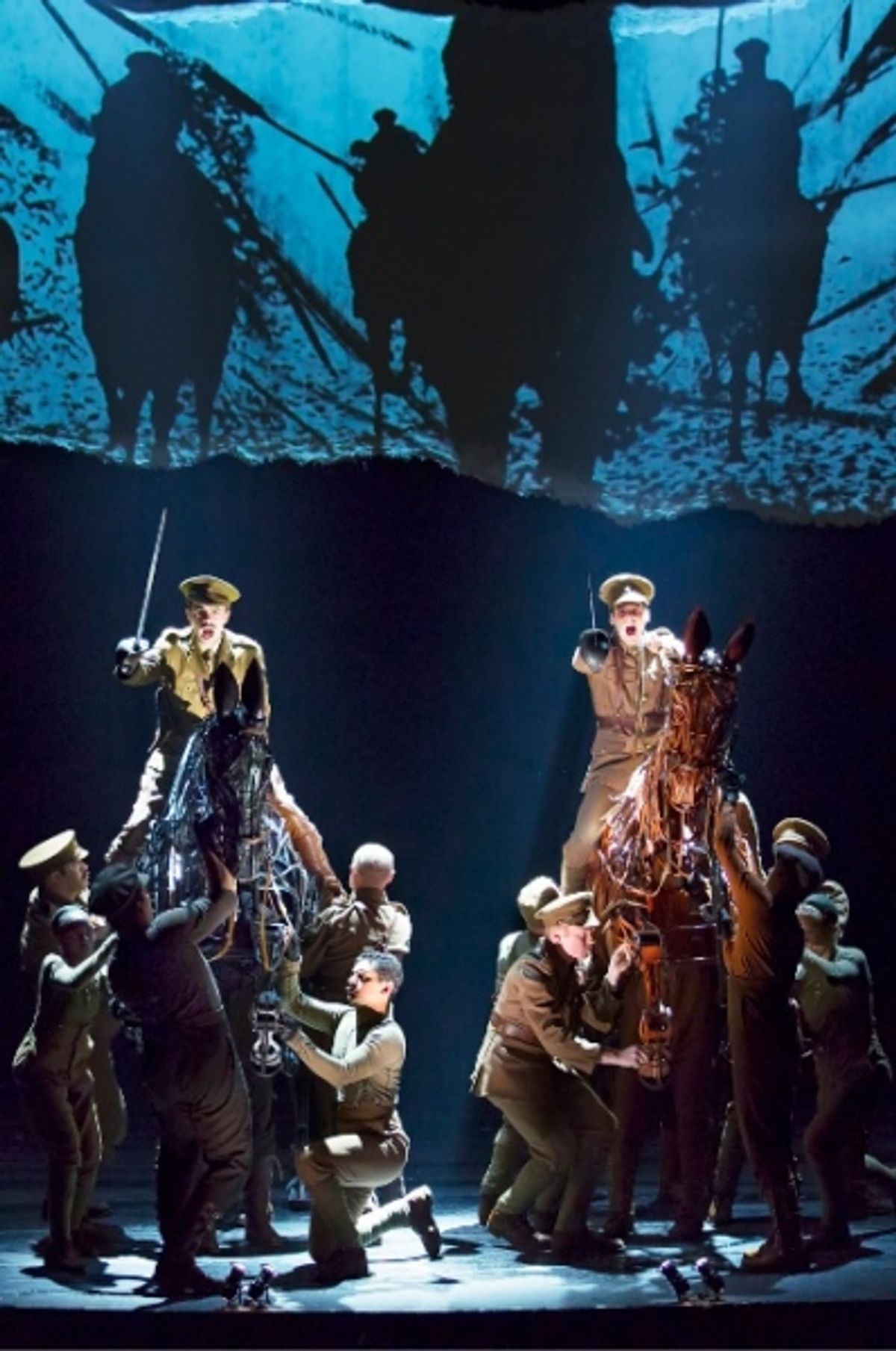 Grayson DeJesus and Michael Wyatt Cox (on horseback) with the Cast of WAR HORSE at 