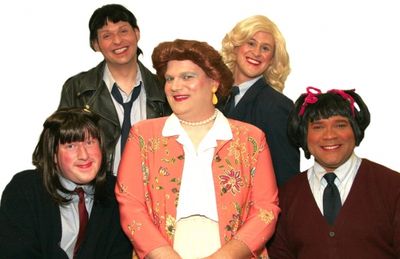 Mrs. Garrett (Joe Bailey, center) is surrounded by her Eastland girls: (from left to  Photo