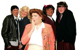 Mrs. Garrett (Joe Bailey, center) is surrounded by her Eastland girls: (from left to  Photo