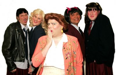 Mrs. Garrett (Joe Bailey, center) is surrounded by her Eastland girls: (from left to  Photo