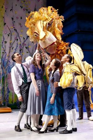 Peter (Christopher Wilson), Susan (Kate Guesman), Lucy (Justine Moral), and Edmund (Rafael Cuesta) with Aslan (puppeteers Michael John Casey, Betsy Rosen, Tracy Ramsay) with Aslan. @ BroadwayWorld Peter (Christopher Wilson), Susan (Kate Guesman), Lucy (Justine Moral), and Edmund (R Photo