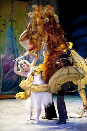 Aslan (puppeteers Michael John Casey, Betsy Rosen, Tracy Ramsay) fights the White Witch (Morgann Rose). @ BroadwayWorld Aslan (puppeteers Michael John Casey, Betsy Rosen, Tracy Ramsay) fights the White Wit Photo