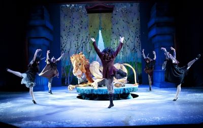 Maugrim the Wolf (Dylan Keane - center)  and the White Witch's minions taunt Aslan. Photo