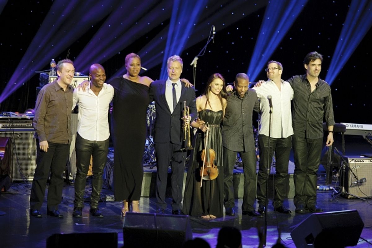 Chris Botti with his team of musicians: vocalist Lisa Fischer, guitarist Leonardo Amuedo, drummer Billy Kilson, bassist Richie Goods, violinist Aurica Duca, pianist Geoffrey Keezer, and keyboardist Andy Ezrin. at 