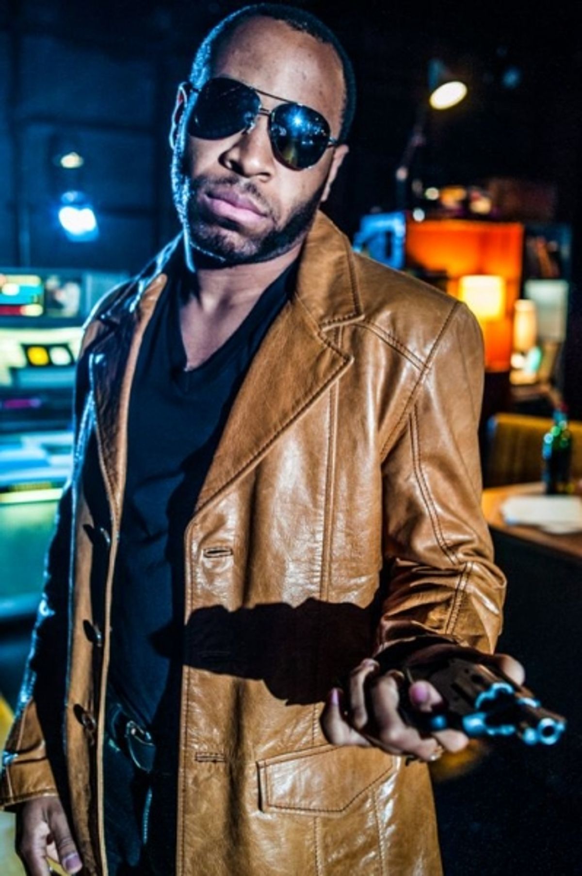 Ugo Chukwu as Gun Dealer at 