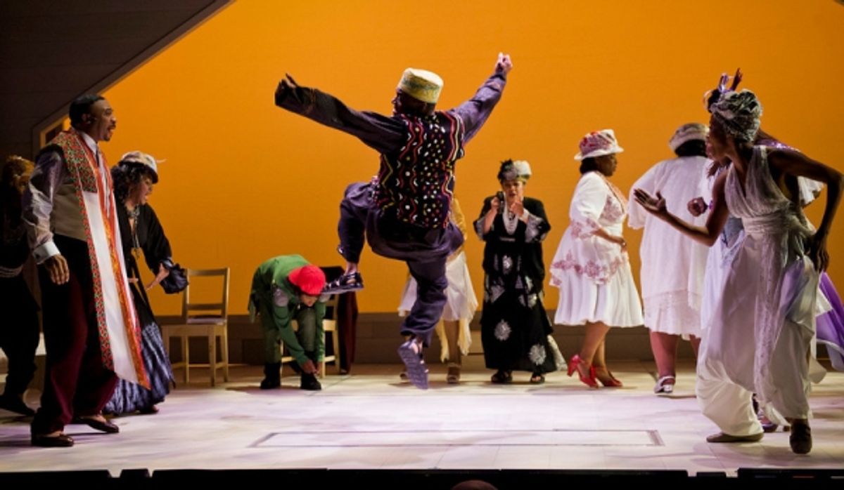 (Center) Kelvin Roston (Ensemble) dances at 