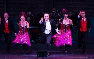 Greg McCormick Allen and Ensemble perform "All Aboard for Broadway." Photo